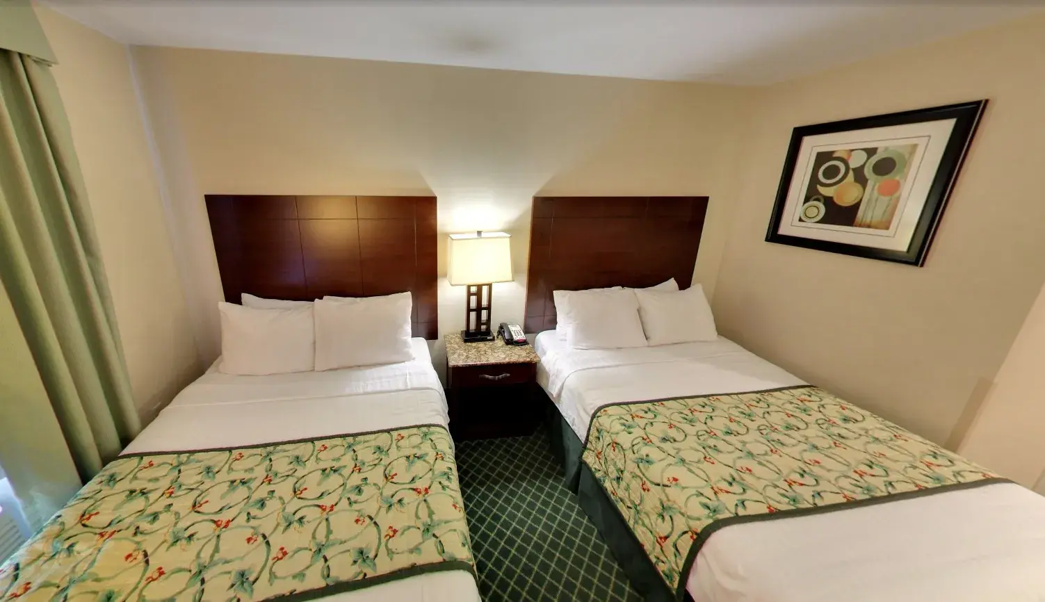 Standard room bed at Corona Hotel New York